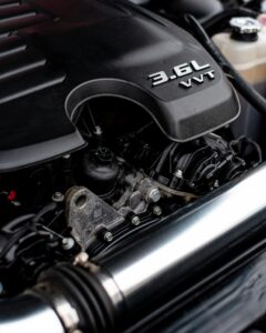 Detailed view of a 3.6L VVT engine, showcasing automotive technology.